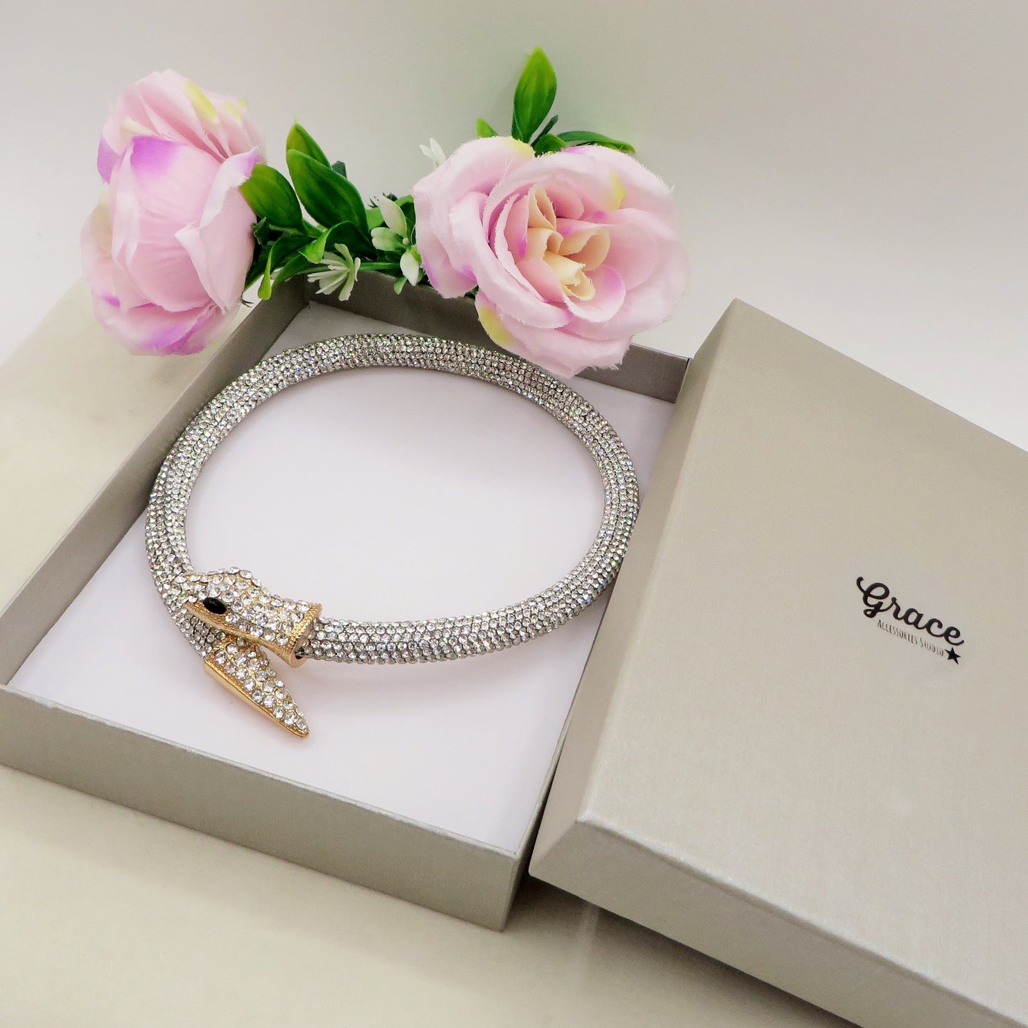KAA CHOKER ~ Girocollo snodato a serpente con cubic zirconia