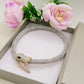 KAA CHOKER ~ Girocollo snodato a serpente con cubic zirconia