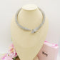 KAA CHOKER ~ Girocollo snodato a serpente con cubic zirconia