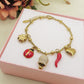 TINKERBELL SHINE LUCKY - Bracciale con campanella zirconata, corno, cuùuore bombè con sonagli, coccinella, quadrifoglio  IN ACCIAIO INOSSIDABILE + cubic zirconia
