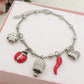 TINKERBELL SHINE LUCKY - Bracciale con campanella zirconata, corno, cuùuore bombè con sonagli, coccinella, quadrifoglio  IN ACCIAIO INOSSIDABILE + cubic zirconia
