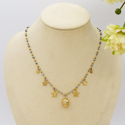 MIRABELLE - ACCIAIO INOSSIDABILE- Collana con campanella e stelline + cubic zirconia