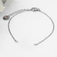 ANGEL Bracciale - ACCIAIO INOSSIDABILE- Bracciale con CUORE con ali in cubic zirconia