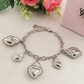 SACRED CHARMS ~ Bracciale ACCIAIO INOSSIDABILE con pendenti maxi e medi cuore sacro