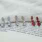 CHERIE - tiny - Orecchini pendenti in cubic zirconia a forma di cuore