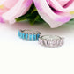 JULIANNE ~ Anello regolabile in ACCIAIO INOSSIDABILE con CUBIC ZIRCONIA taglio baguette