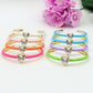 CHERIE FLUO - BRACCIALE RIGIDO SMALTATO CON CUBIC ZIRCONIA A FORMA DI CUORE