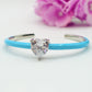 CHERIE FLUO - BRACCIALE RIGIDO SMALTATO CON CUBIC ZIRCONIA A FORMA DI CUORE