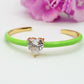 CHERIE FLUO - BRACCIALE RIGIDO SMALTATO CON CUBIC ZIRCONIA A FORMA DI CUORE
