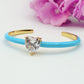 CHERIE FLUO - BRACCIALE RIGIDO SMALTATO CON CUBIC ZIRCONIA A FORMA DI CUORE