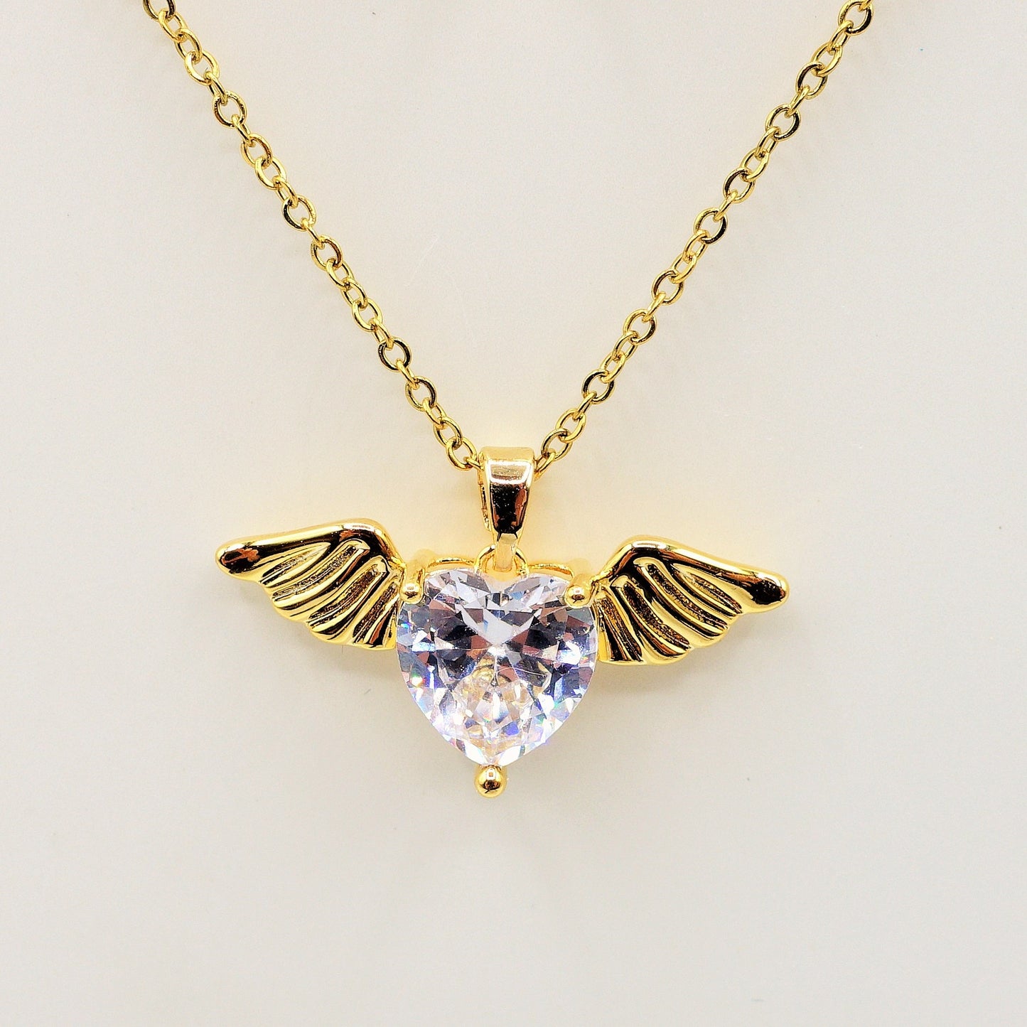 ANGEL - ACCIAIO INOSSIDABILE- collana con pendente CUORE con ali in cubic zirconia