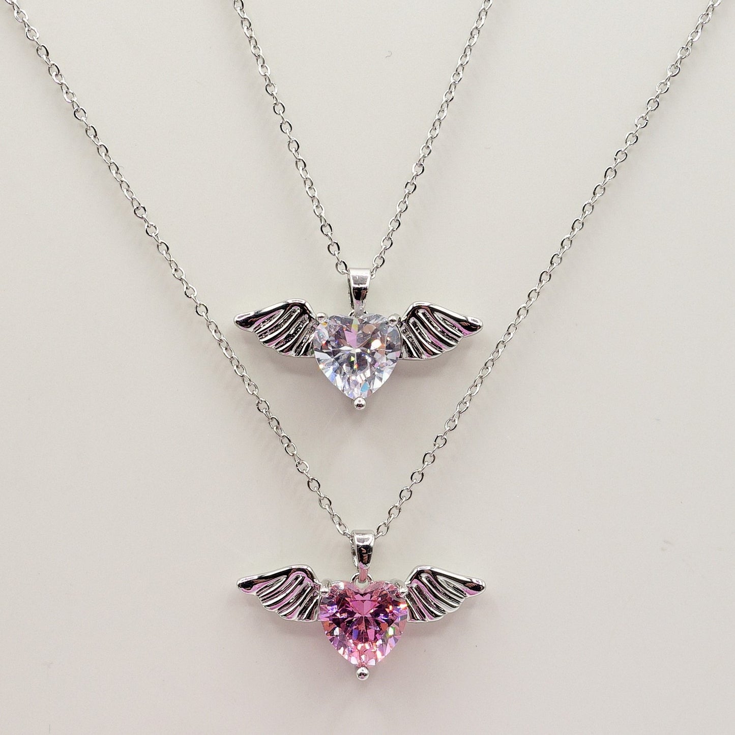 ANGEL - ACCIAIO INOSSIDABILE- collana con pendente CUORE con ali in cubic zirconia
