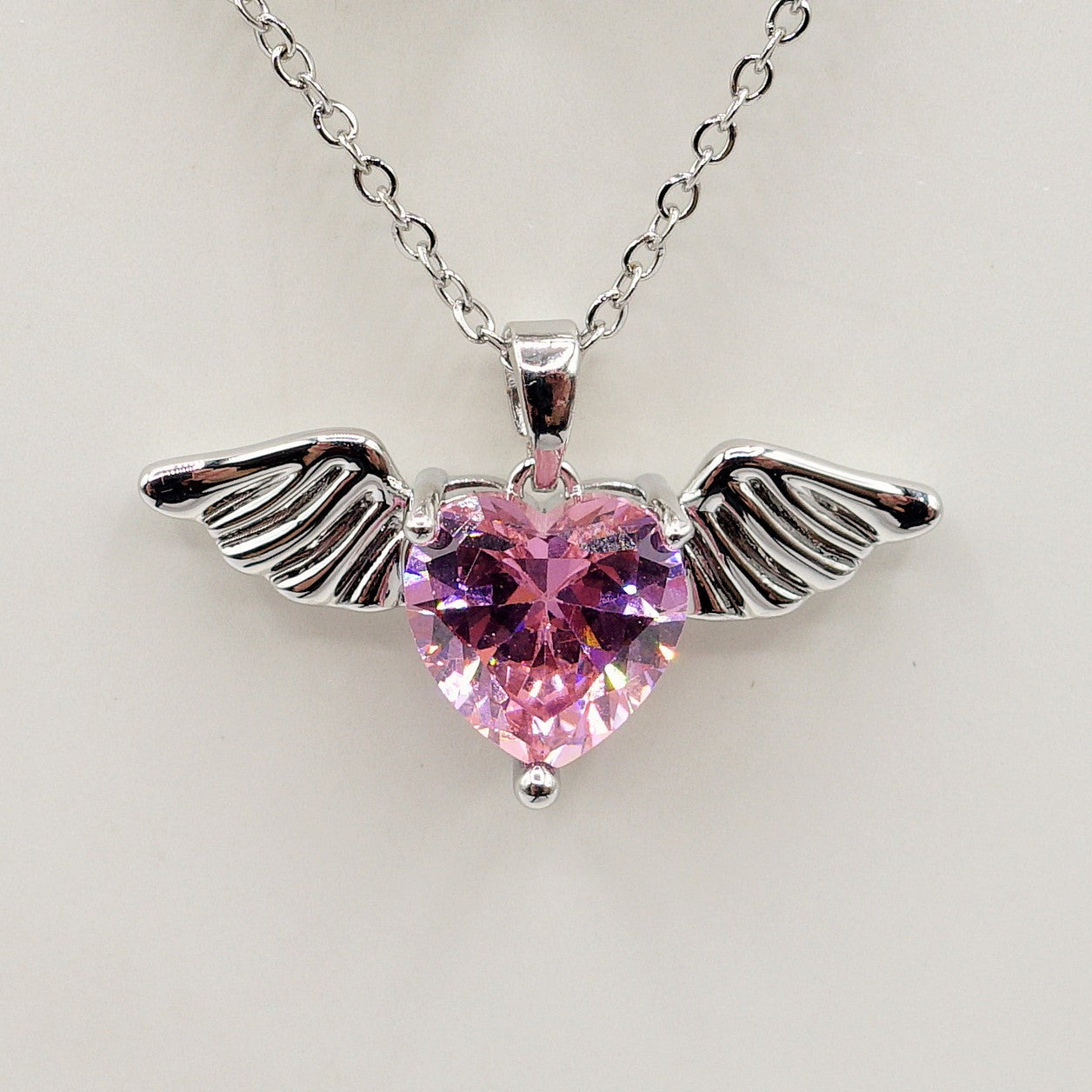 ANGEL - ACCIAIO INOSSIDABILE- collana con pendente CUORE con ali in cubic zirconia