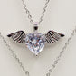 ANGEL - ACCIAIO INOSSIDABILE- collana con pendente CUORE con ali in cubic zirconia