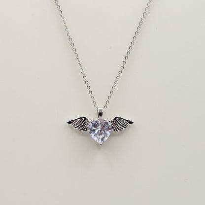 ANGEL - ACCIAIO INOSSIDABILE- collana con pendente CUORE con ali in cubic zirconia