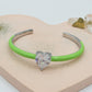 CHERIE FLUO - BRACCIALE RIGIDO SMALTATO CON CUBIC ZIRCONIA A FORMA DI CUORE