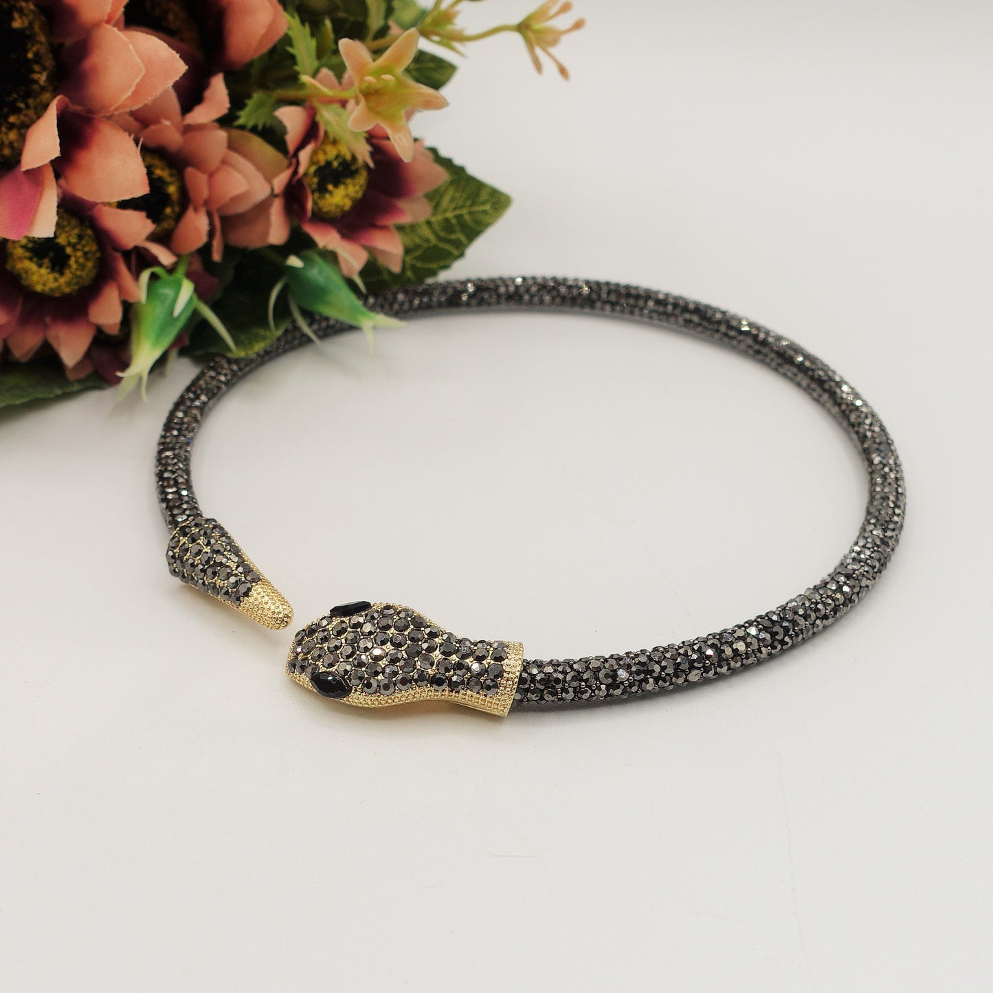 KAA CHOKER ~ Girocollo snodato a serpente con cubic zirconia