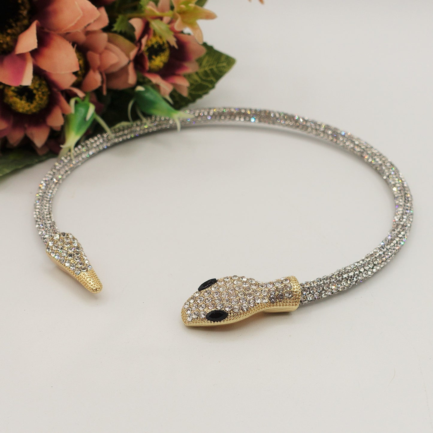 KAA CHOKER ~ Girocollo snodato a serpente con cubic zirconia