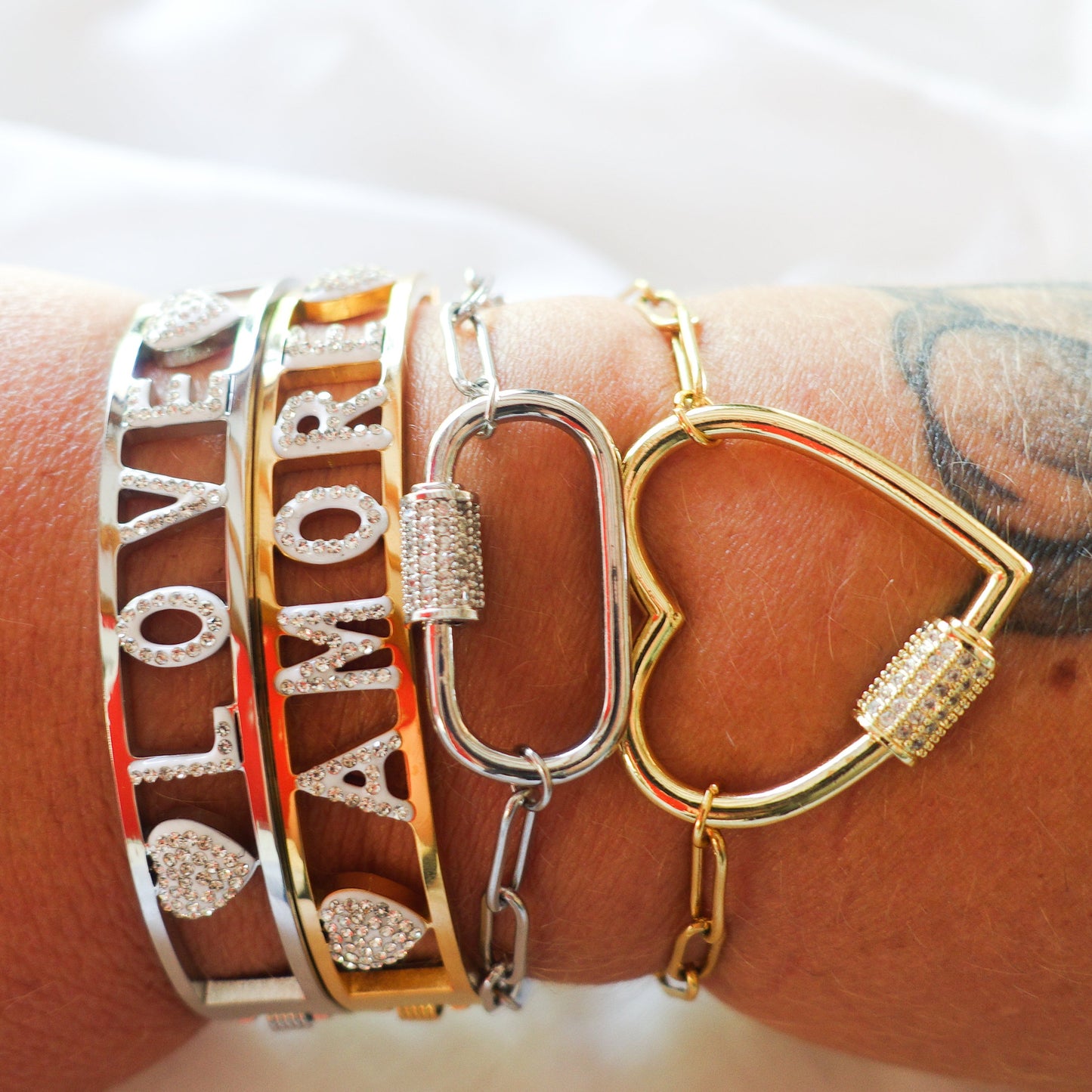 AMORE ~ Bracciale manetta in ACCIAIO INOSSIDABILE con cubic zirconia