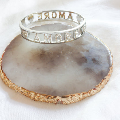 AMORE ~ Bracciale manetta in ACCIAIO INOSSIDABILE con cubic zirconia