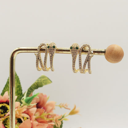 BETTY ~ orecchini bottone a serpente con cubic zirconia