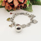 BABY ~ACCIAIO INOSSIDABILE - Bracciale con pallina chiama angeli e ciondoli nascita