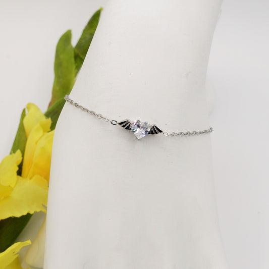 ANGEL Bracciale - ACCIAIO INOSSIDABILE- Bracciale con CUORE con ali in cubic zirconia