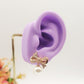 CALLA ~ orecchini bottone con fiocco zirconato e perla