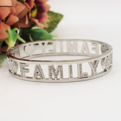 FAMILY BRACCIALE A MANETTA~ ACCIAIO INOSSIDABILE - CON SCRITTA FAMILY E ZIRCONI