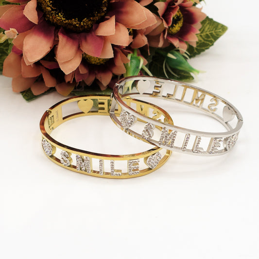 SMILEBracciale a manetta - Acciaio inossidabile - con scritta smile e zirconi